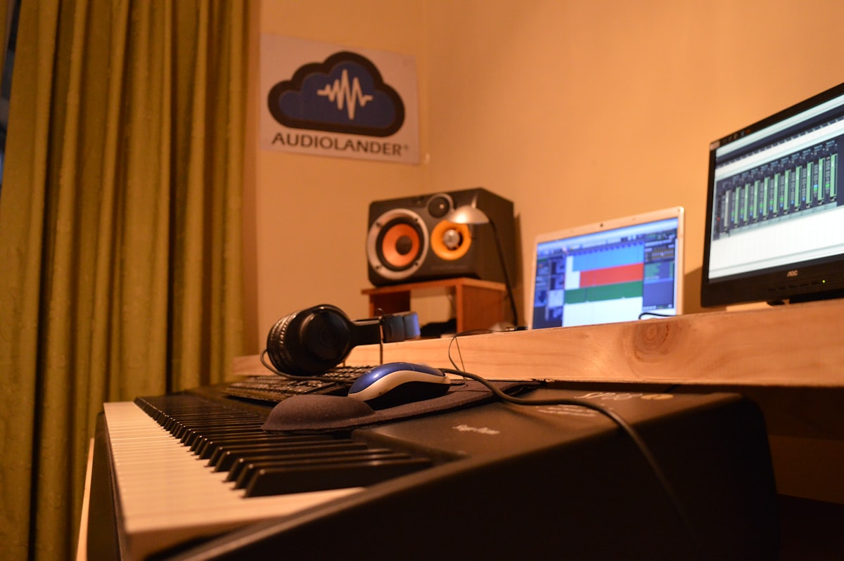 Audio interface and studio headphones on a production desk