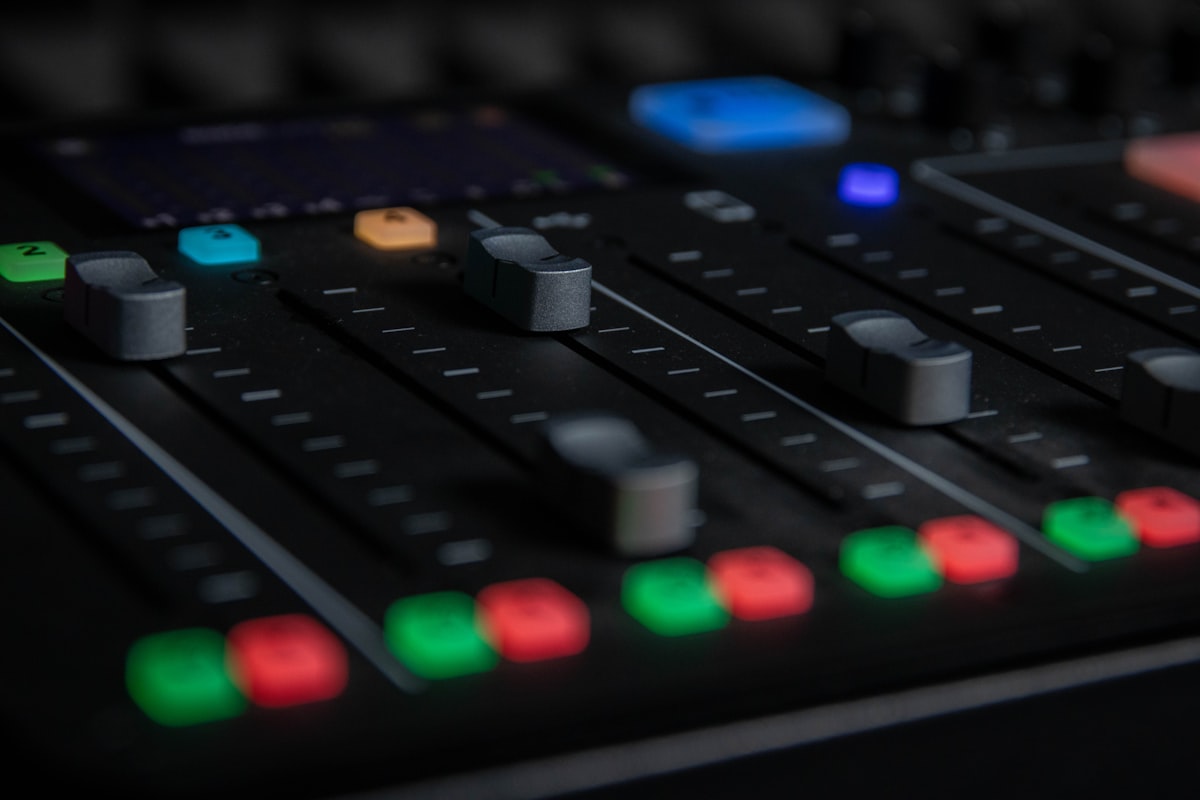 Studio headphones resting on an audio workstation